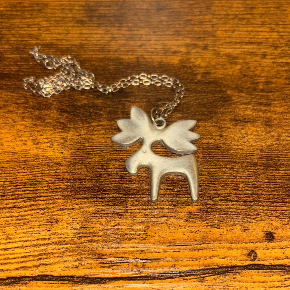Swedish designer Rune Tennesmed pewter moose necklace.